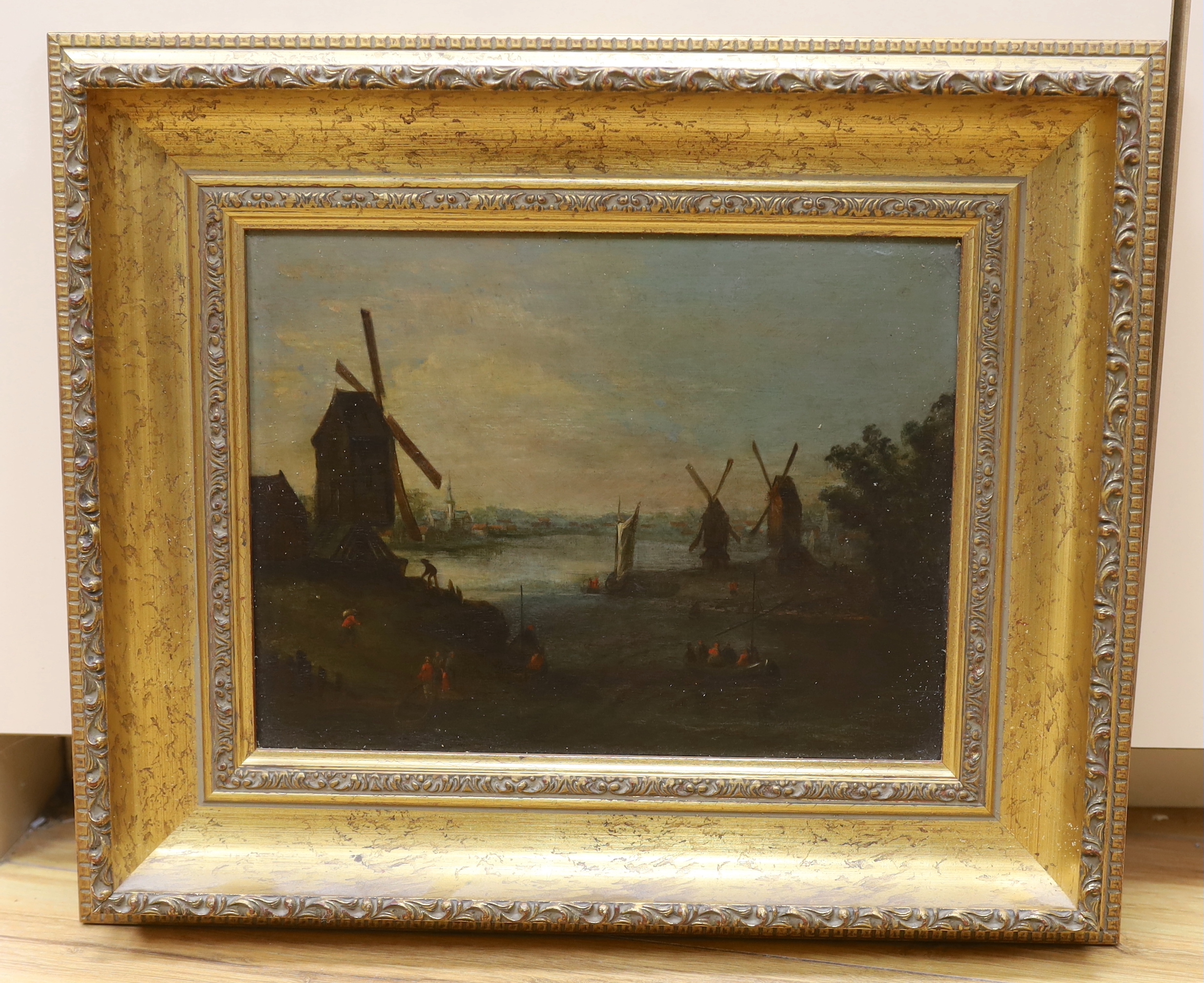 19th century Dutch school, oil on board, River landscape with boats and windmills, Croydon Galleries label verso, 28cm x 21cm